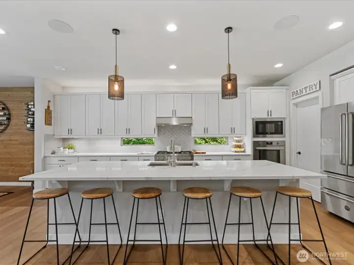 Large center island ideal for meal prep, entertaining, and everyday living Large center island ideal for meal prep, entertaining, and everyday living