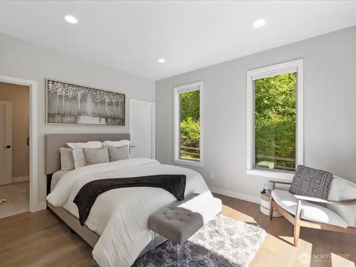 Potential second primary suite on the main level, ideal for guests or multi-generational living Potential second primary suite on the main level, ideal for guests or multi-generational living