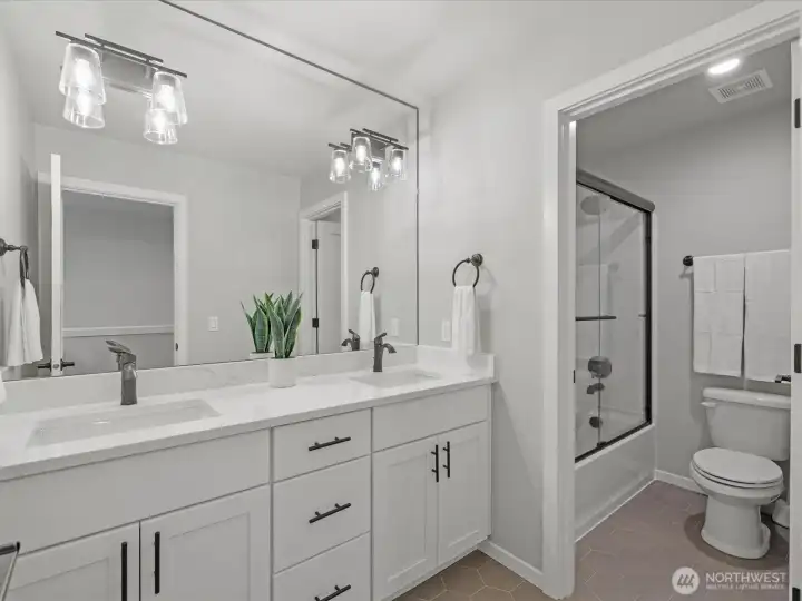 Second upstairs bathroom thoughtfully designed with stylish finishes and convenient access to bedrooms Second upstairs bathroom thoughtfully designed with stylish finishes and convenient access to bedrooms