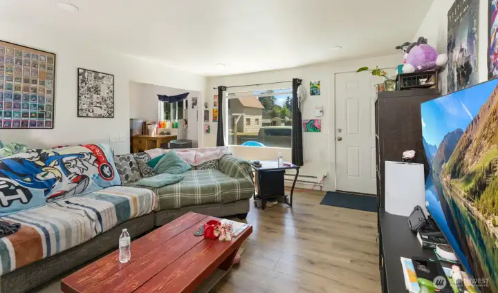 Main living space features durable flooring and a practical layout for daily use.
