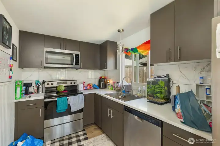 Well-appointed kitchen features modern finishes and a functional layout for everyday use.
