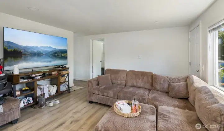 Generous living room provides an inviting setting for everyday living and entertaining.