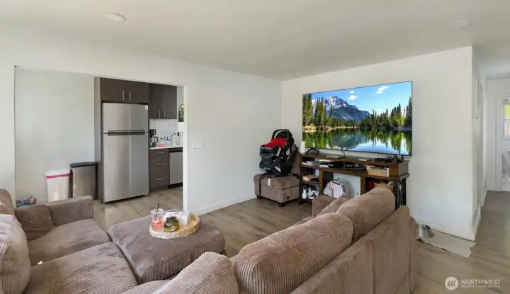 Open-concept design provides flexible space for seating, dining, and daily activities.