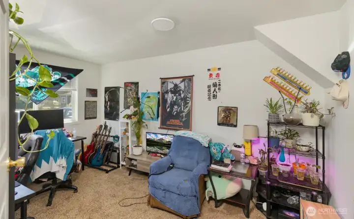 Comfortable bedroom with convenient access to the home's shared living spaces.