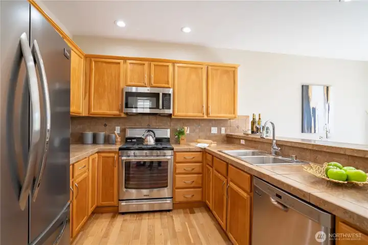 Kitchen with stainless steel appliances.
