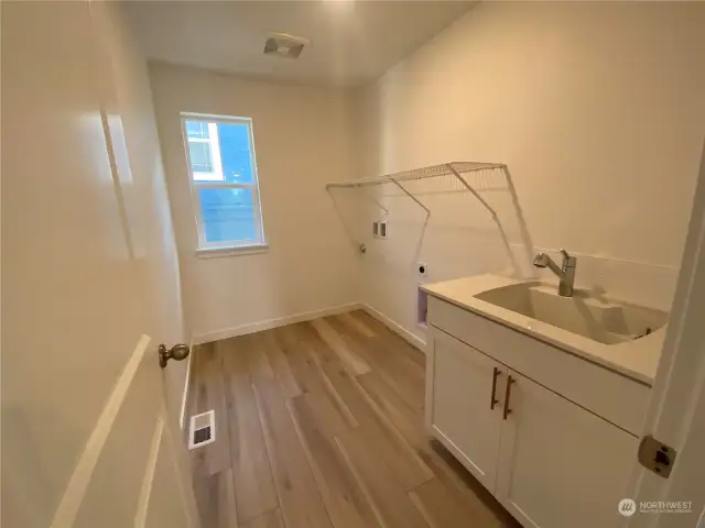 Laundry Room With Sink and Lower Cabinet