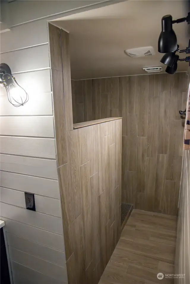 Custom built walk-in shower in ADU bathroom.
