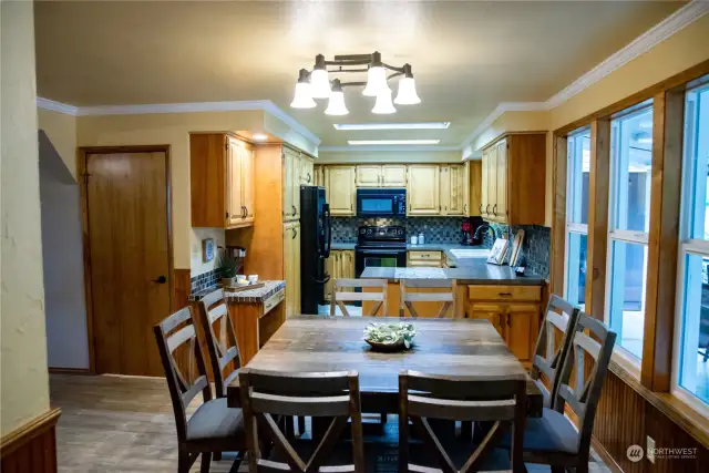 Kitchen and dining room allows for family gathering.