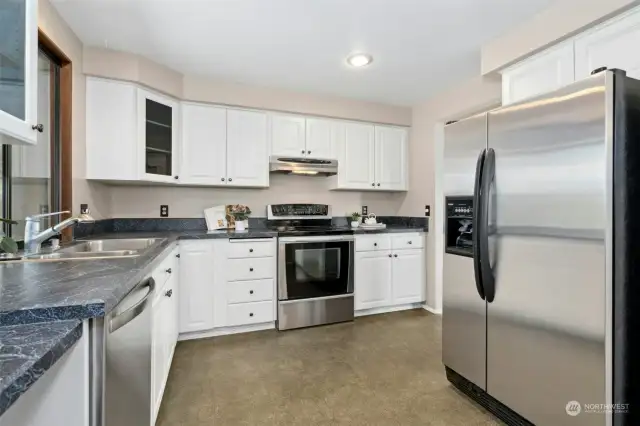 Updated kitchen with abundant storage.