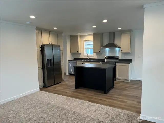 Another view of kitchen from living room.