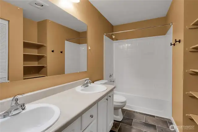 Double sink vanity, new flooring in bathroom