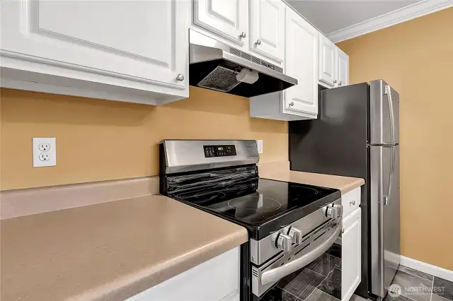 SS appliances and new flooring in kitchen