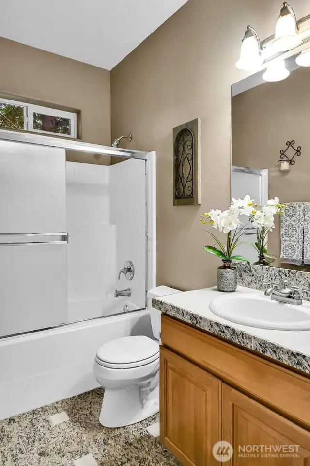 Full Guest Bath on Main Floor between Bedroom #2 and #3