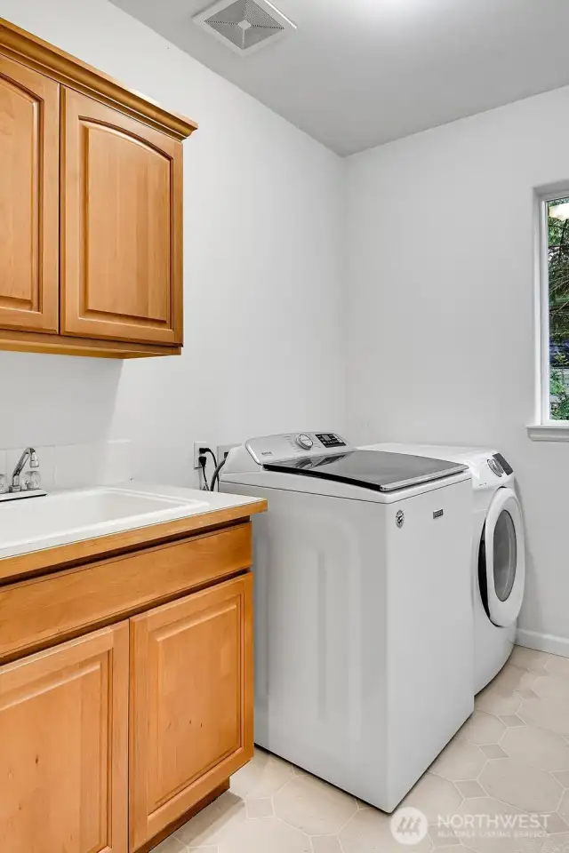 Laundry Room on main floor with auxiliary sink