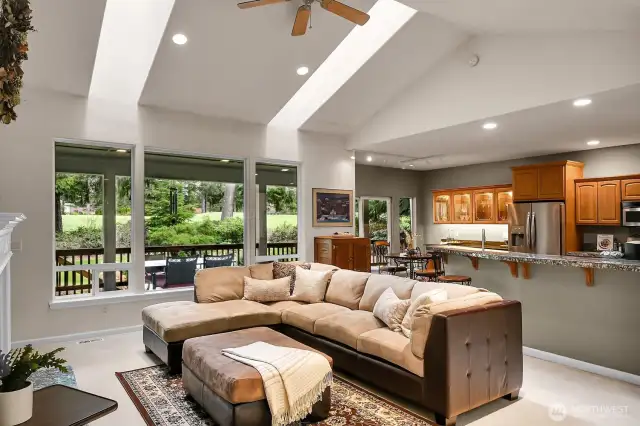Great Room conveniently located to spacious Kitchen and generous golf course views.