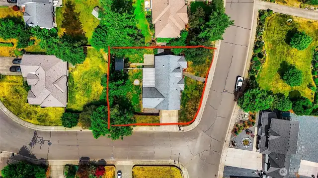Larger corner fully fenced lot with side driveway/garage plenty of wide street parking and surrounded by nice homes on bigger lots