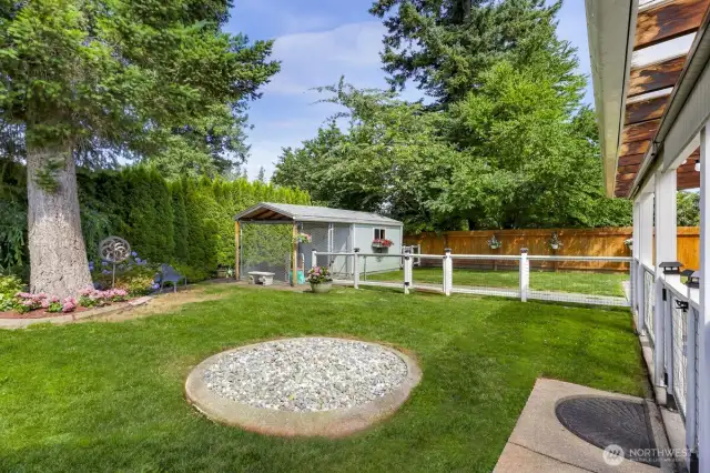 Mature landscaping & fencing make th perfect backyard