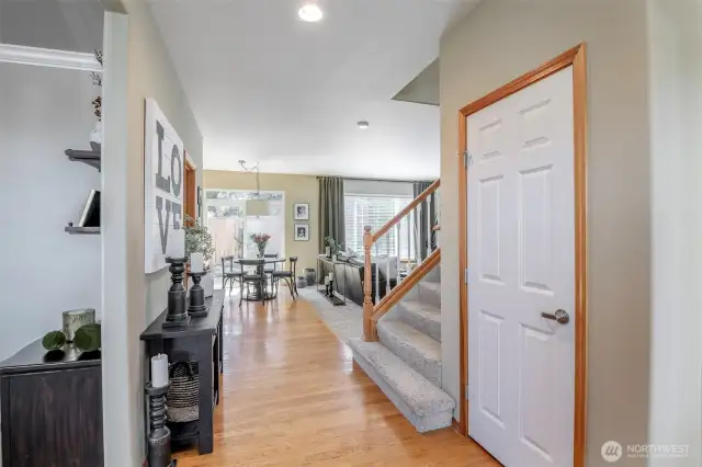 Photo from the main entrance leading back into this open space layout.  The dining room is to the left, the den/office/or make it a bedroom on the main for guests is to the right of the main entry.