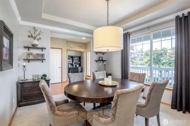 Beautiful dining room with coffered ceilings.