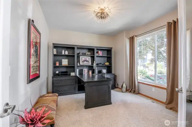 Den/office/or make it a bedroom on the main for guests is to the right of the main entry.
