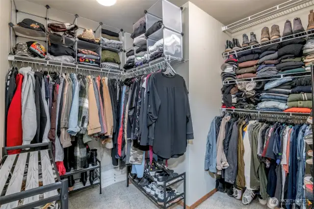 Primary Bedroom has Vaulted Ceilings, nice window for letting in the daylight, a huge walk in closet, 5 piece bath + large vanity.