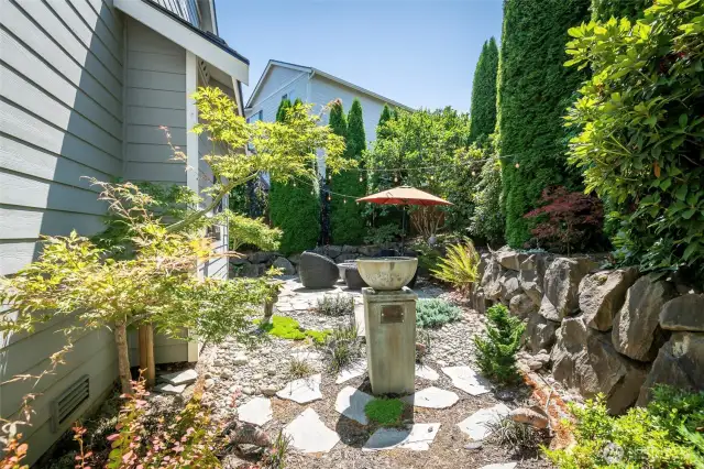 Extensive Landscaping in Front, Back & Side Yard.  This owner might as well been a Accredited Landscape & Design Professional.