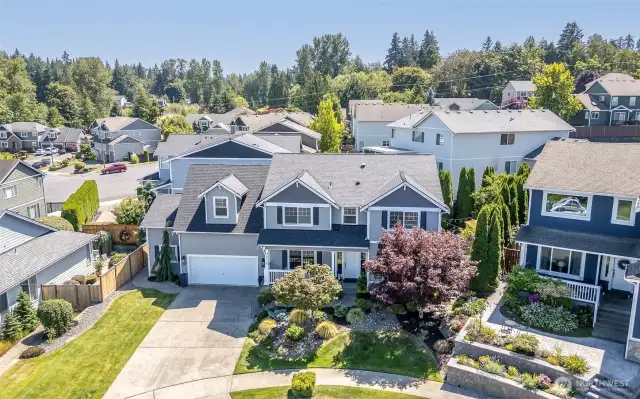 This home sits at the end of the Cul De Sac.  Very little traffic.  Plenty of off street parking in this deep driveway.  +++ the 3 car garage is deeper than traditional garages & it has super high ceilings.  Tons of storage ability.  Or make a workout room in the 3rd bay of the garage.  Plenty of power for TVs, Audio, Sauna, or whatever you like in the enormous garage.  It is also wired for an electric car charger (just the expensive part ... the panel to junction in the wall. No outlet currently installed).