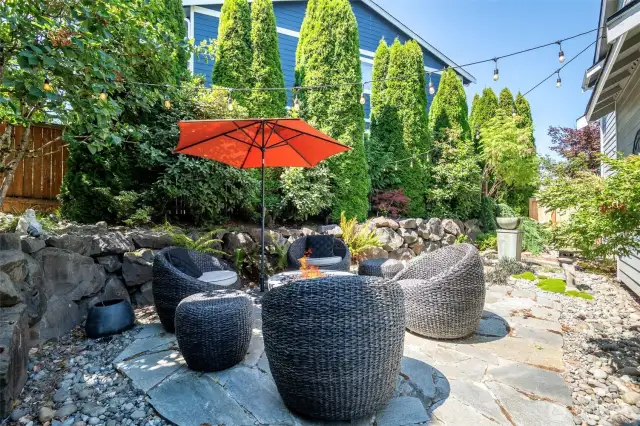 Lovely Hardscape surrounding the exterior for convenient acces to enjoy all of this parcel. Very low maintenance.  Lots of seating areas.