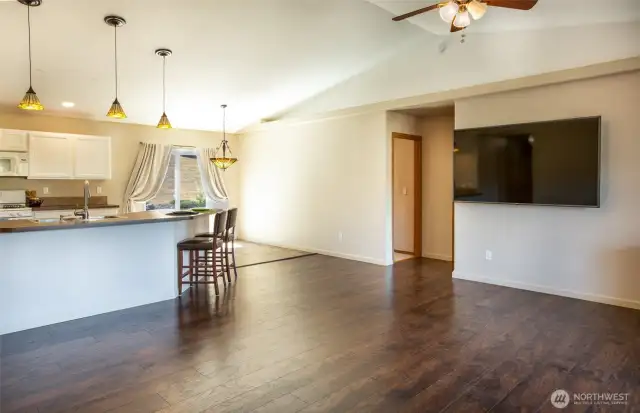 The great room is truly great! It a very wise use of space with cathedral ceilings overhead.
