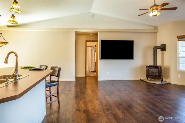 From this vantage point you are looking toward the area with 2 bedroom and a full bath in between.