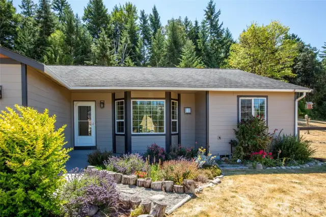 Prennial flowers and shrubs greet you at the front door. Lavender and butterfly bushes smell spectacular.