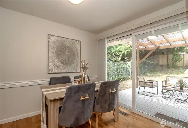 Dining area with 96" sliding door to the backyard