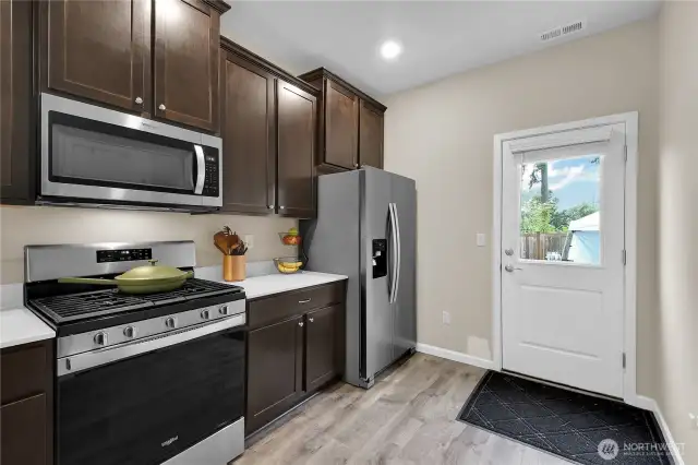 All appliances stay.  Door accesses the back patio
