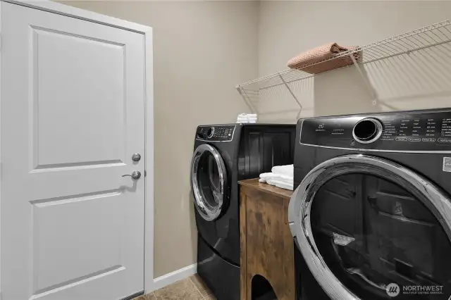 Laundry room leads to garage.  Accessed from entry hall.