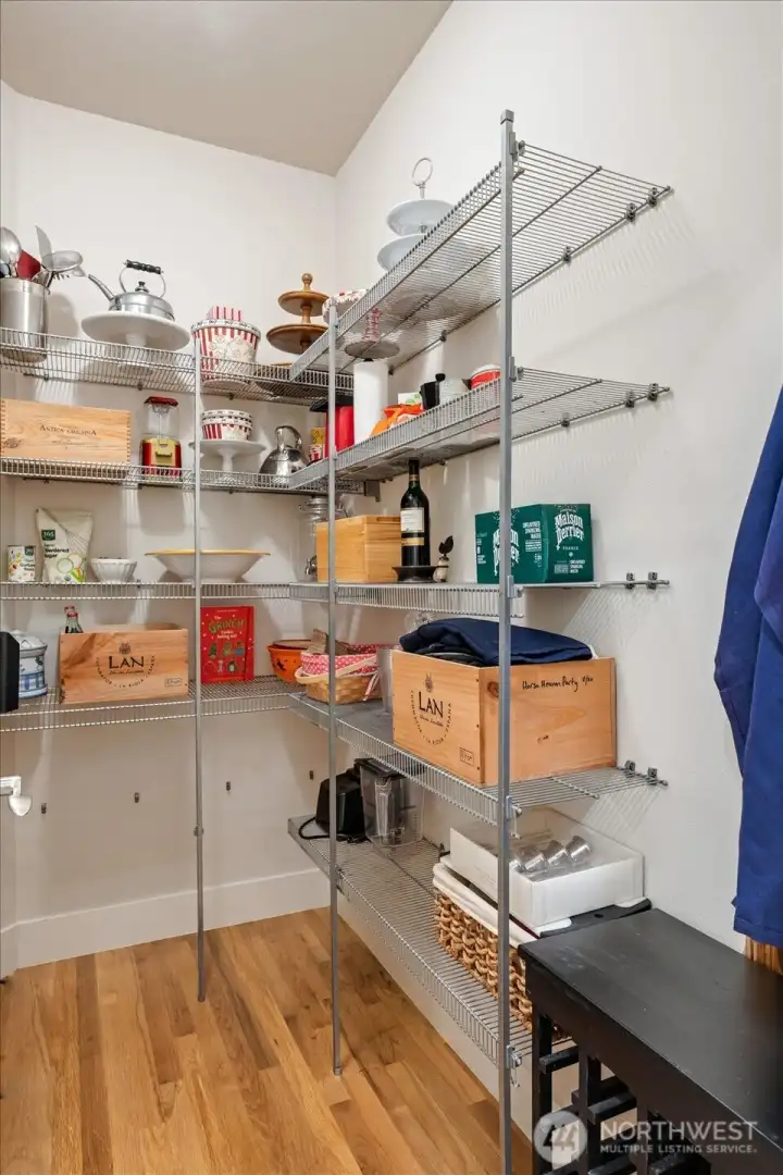 Spacious walk-in pantry that is an absolute delight.