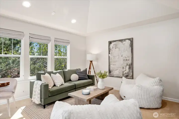 Large bonus room that is grand and great for game days & movie nights! Vaulted ceilings, walls of windows make this a dreamy space!