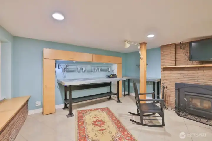 Basement with wood burning fireplace and plenty of storage