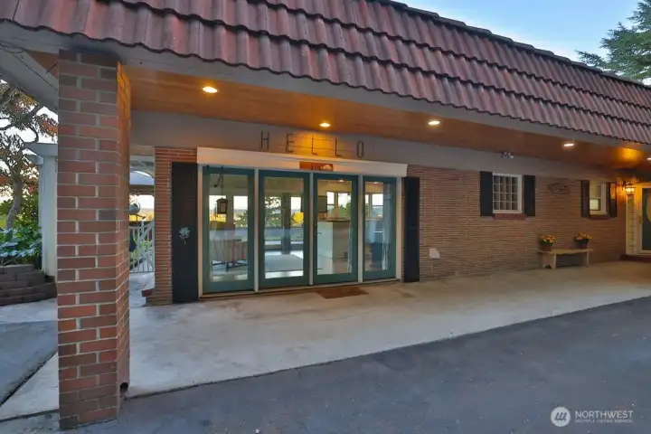 French doors leads to kitchen and living room