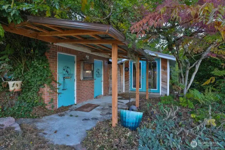 Doors to the left are the original the outhouses for the property have been decommissioned and used as storage.