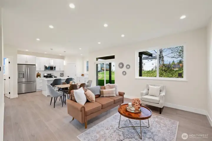 Luxury vinyl plank flooring throughout the main floor.