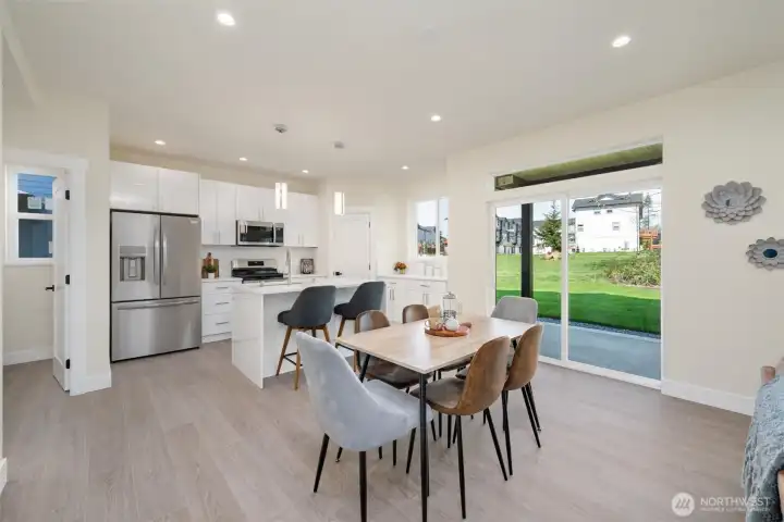 The dining area overlooks the covered back patio.