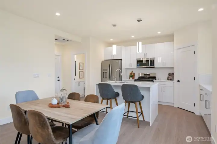 Walk in pantry in the corner of the kitchen.