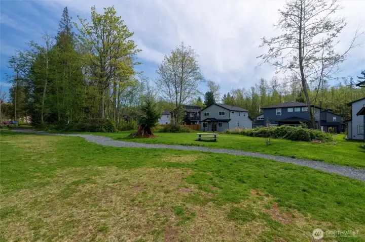 A view of the back of the home from the neighborhood park, directly behind the home.