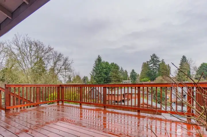 Step out the sliding door to a large, cared-for deck, perfect for morning coffee, family time, or entertaining friends.