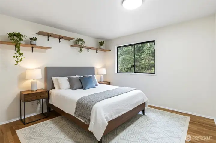 Bedroom-Photos have been virtually staged. Furniture and décor shown are for illustrative purposes only.