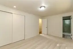 Main level primary bedroom. New carpet throughout the home