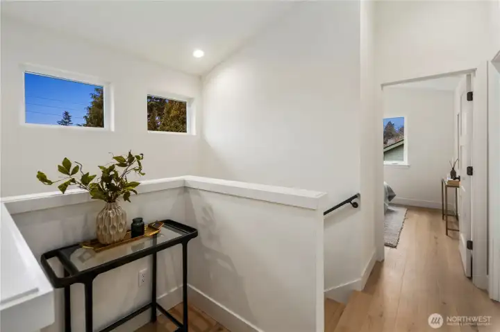 Upper floor landing has niche for study or display