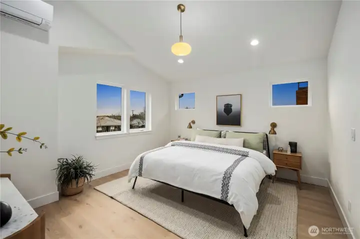 Spacious Primary suite with vaulted ceiling speaks volume!