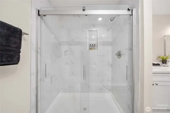 Beautifully tiled shower.