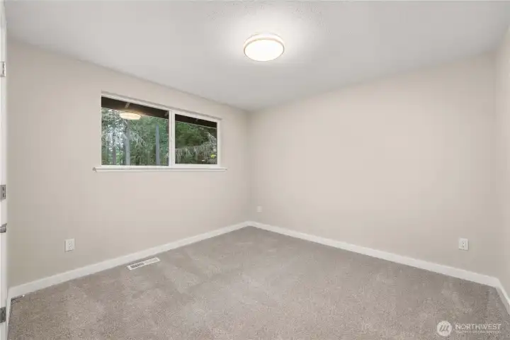 Bedroom #2 is located off the kitchen.